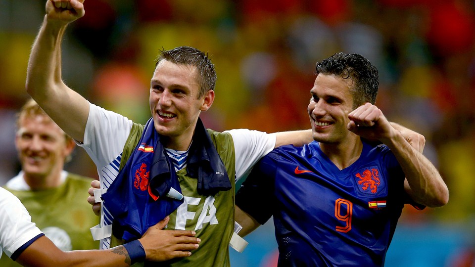 Robin van Persie of the Netherlands (R) celebrates with Stefan de Vrij of the Netherlands (Photo by Alex Grimm - FIFA/FIFA via Getty Images)