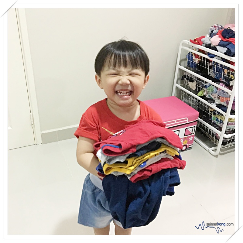 Parenting Is Made Easy with My Modern Parenthood by Kao - Aiden enjoys helping us fold laundry :)