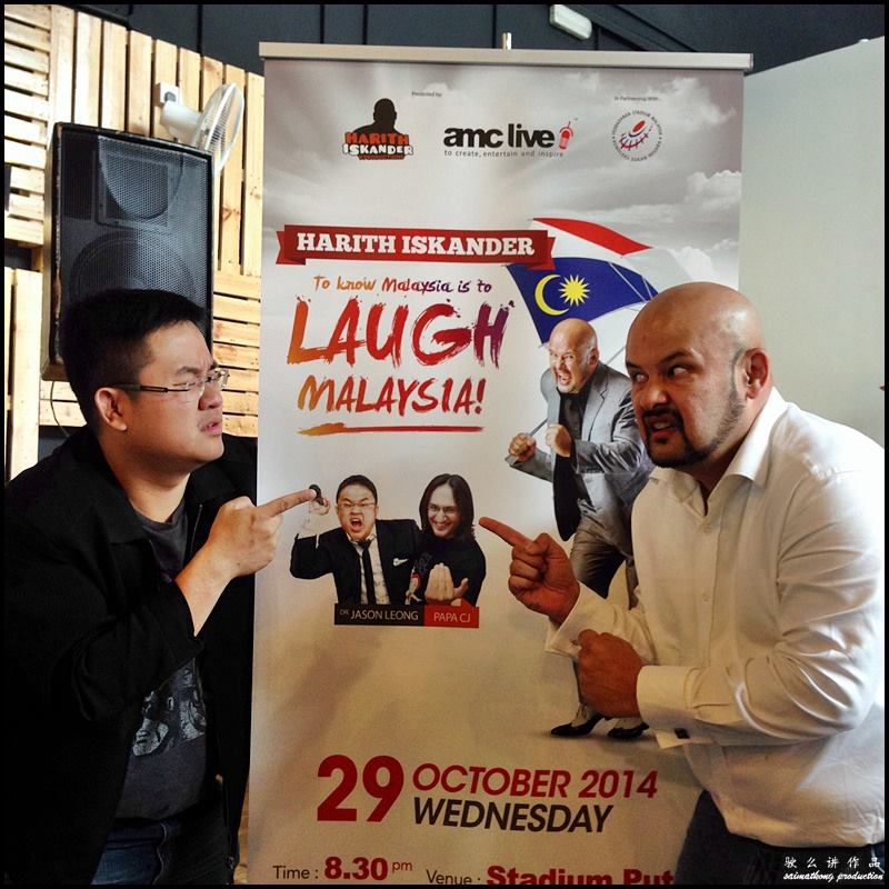 Dr Jason Leong & Harith Iskander posing for pictures.
