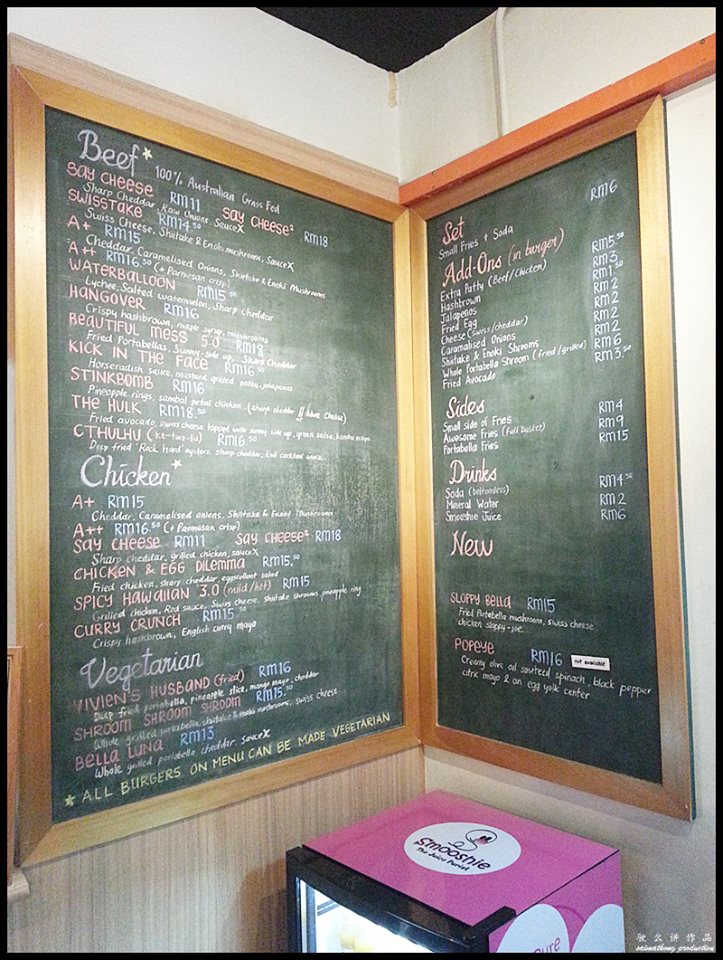 myBurgerLab Menu written on a chalkboard in front next to the cashier counter.