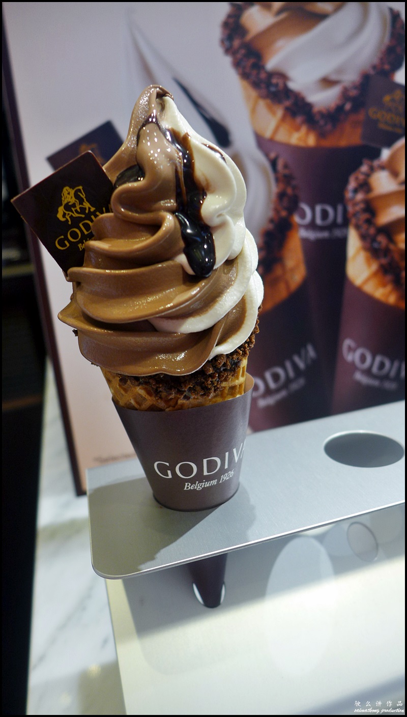Enjoying the super delicious Dark Chocolate soft-serve @ Godiva Chocolatier