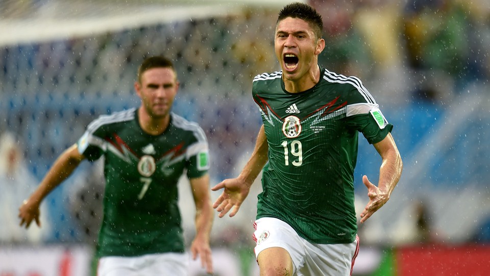 Oribe Peralta of Mexico celebrates after scoring (Photo by Shaun Botterill - FIFA/FIFA via Getty Images)