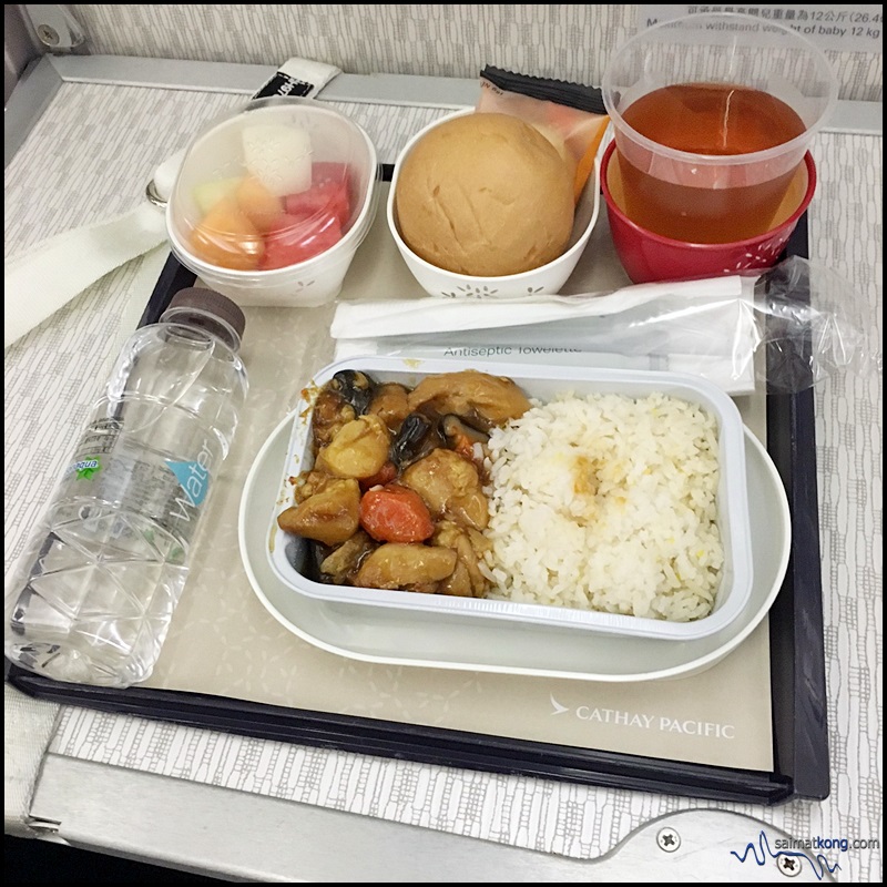 Our in-flight meal. I had the braised chicken with potatoes and white fungus rice while the wife had the pasta. 
