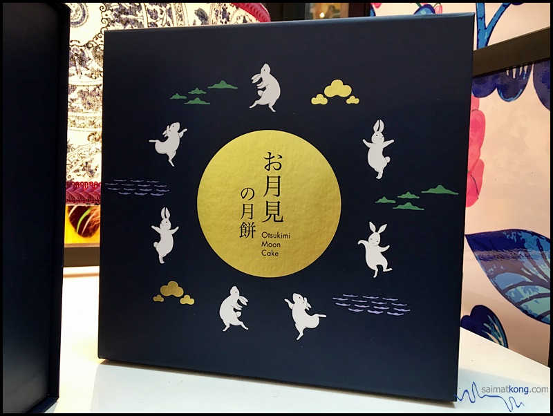 Love the cute box packaging with images of cute rabbits dancing / jumping / hopping around the round moon :D 