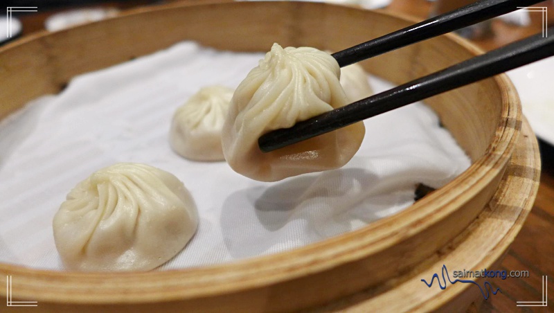 Din Tai Fung Malaysia turns 10 - Gently lift a Xiao Long Bao with your chopsticks (try your best not to burst it)